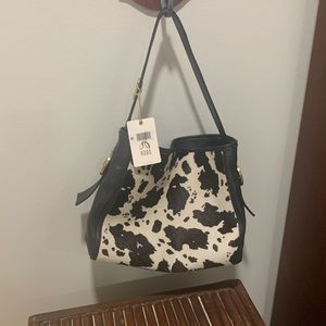 Hobo brand cow, print, black-and-white, soft black leather handbag, almost new